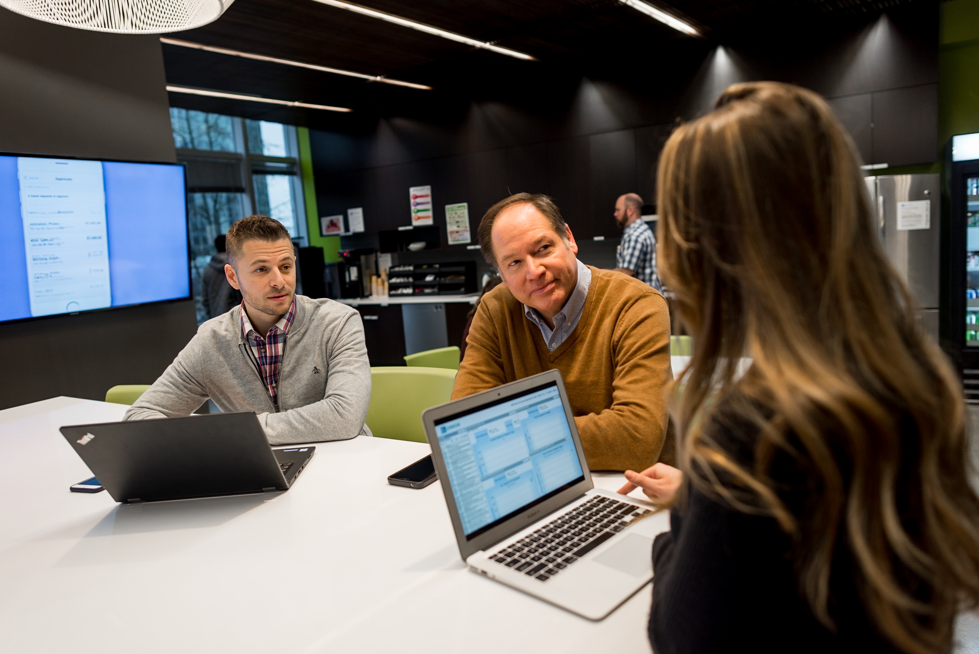 people in a meeting working