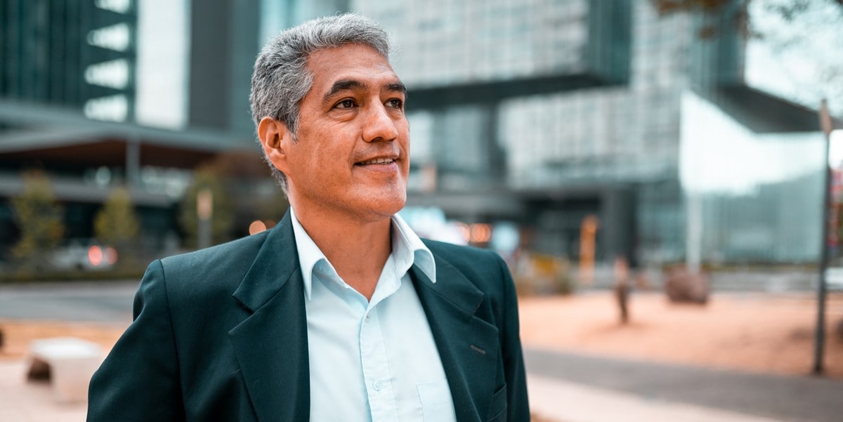 professional man standing outside office building
