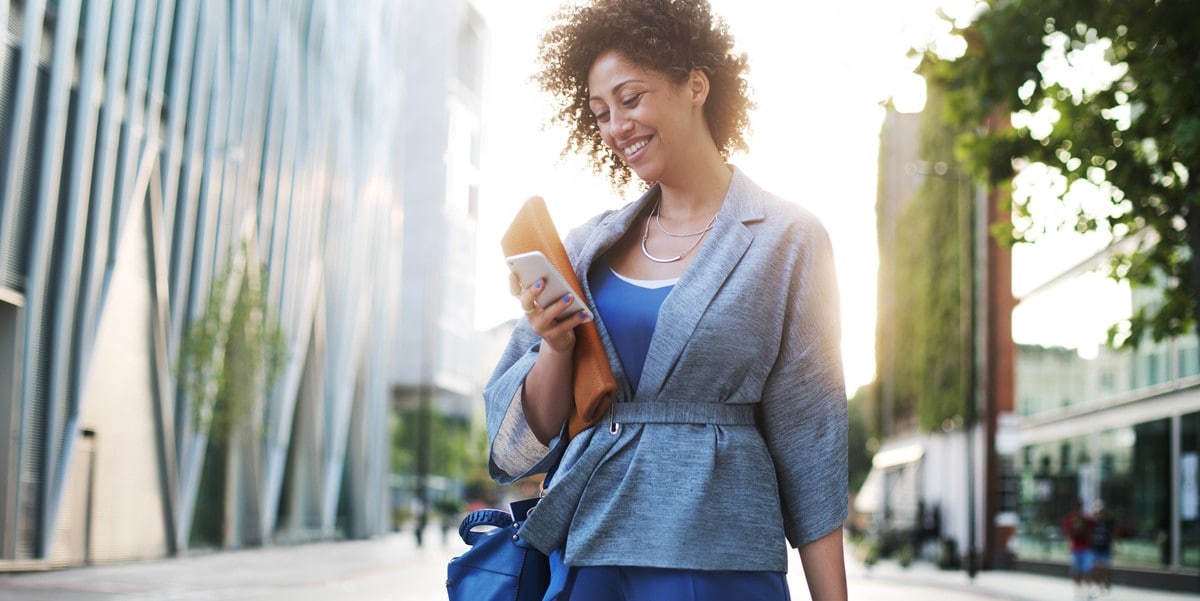 woman outside with luggage